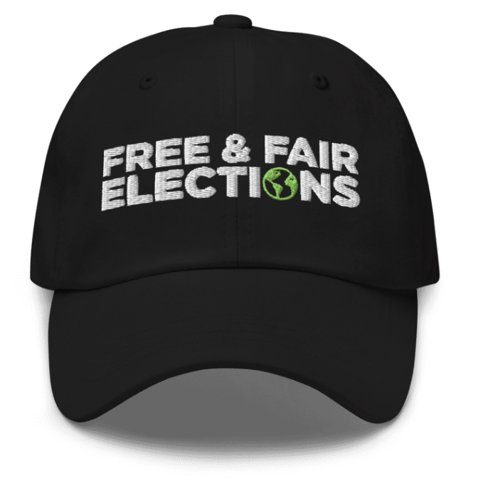 Black cap with 'FREE & FAIR ELECTIONS' text on a white background