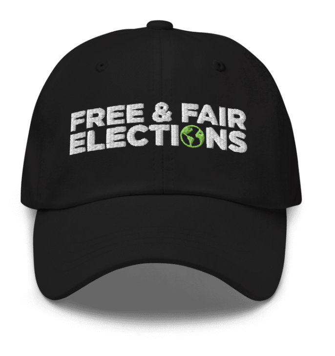 Black cap with 'FREE & FAIR ELECTIONS' text on a white background